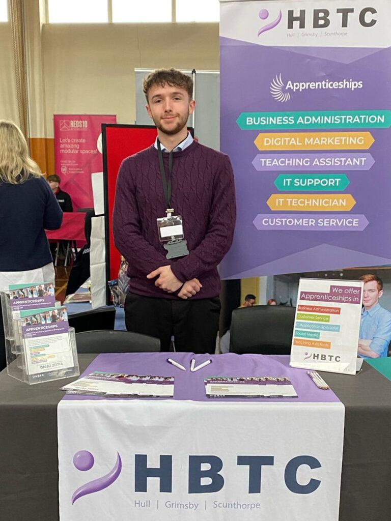 Photo of Digital Marketing Apprentice, Toby, at a recruitment fair