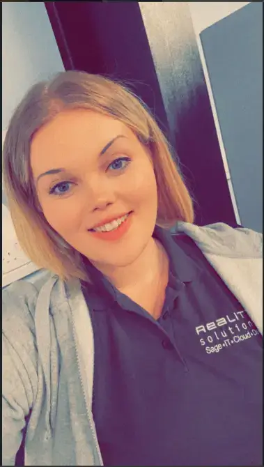 Photo of Ellie, Project Manager at Reality Solutions that has recently completed her team leader apprenticeship