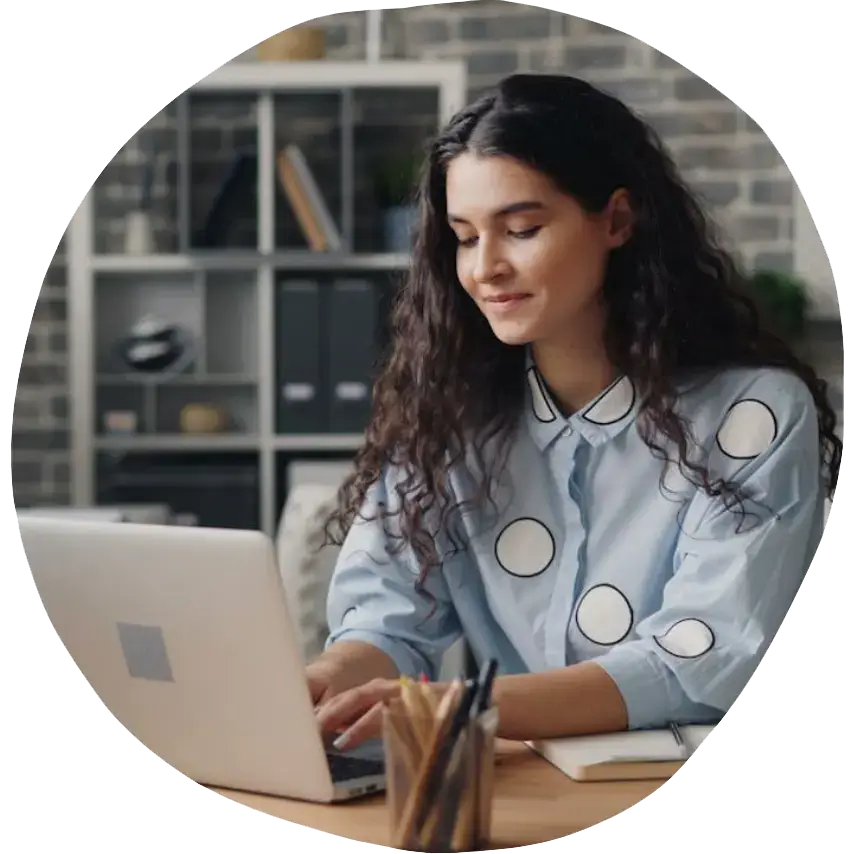 Photo of a young professional female working at a computer