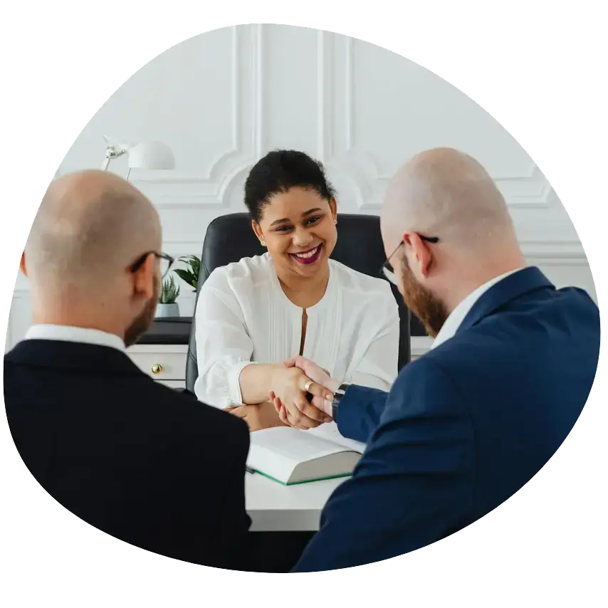 Free Courses for Unemployed: photo of a woman shaking hands with an interviewer