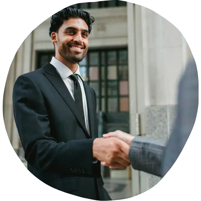 Free Courses for Unemployed: photo of a man wearing a suit shaking someone's hand