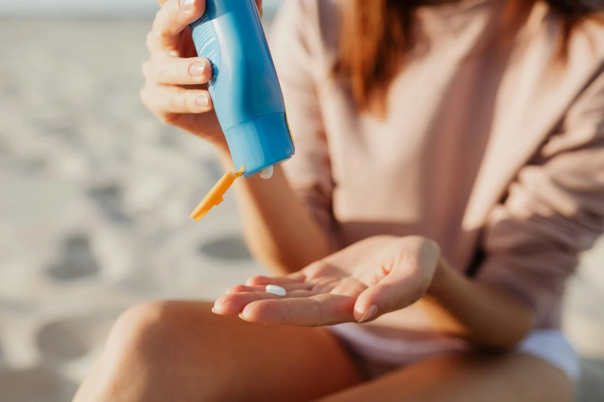 Using sunscreen to protect, part of the sun safety checklist for summer.